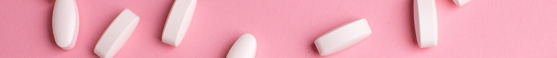 white-vitamin-pills-to-raise-immunity-on-pink-back-2022-01-30-07-02-59-utc (3) (1)